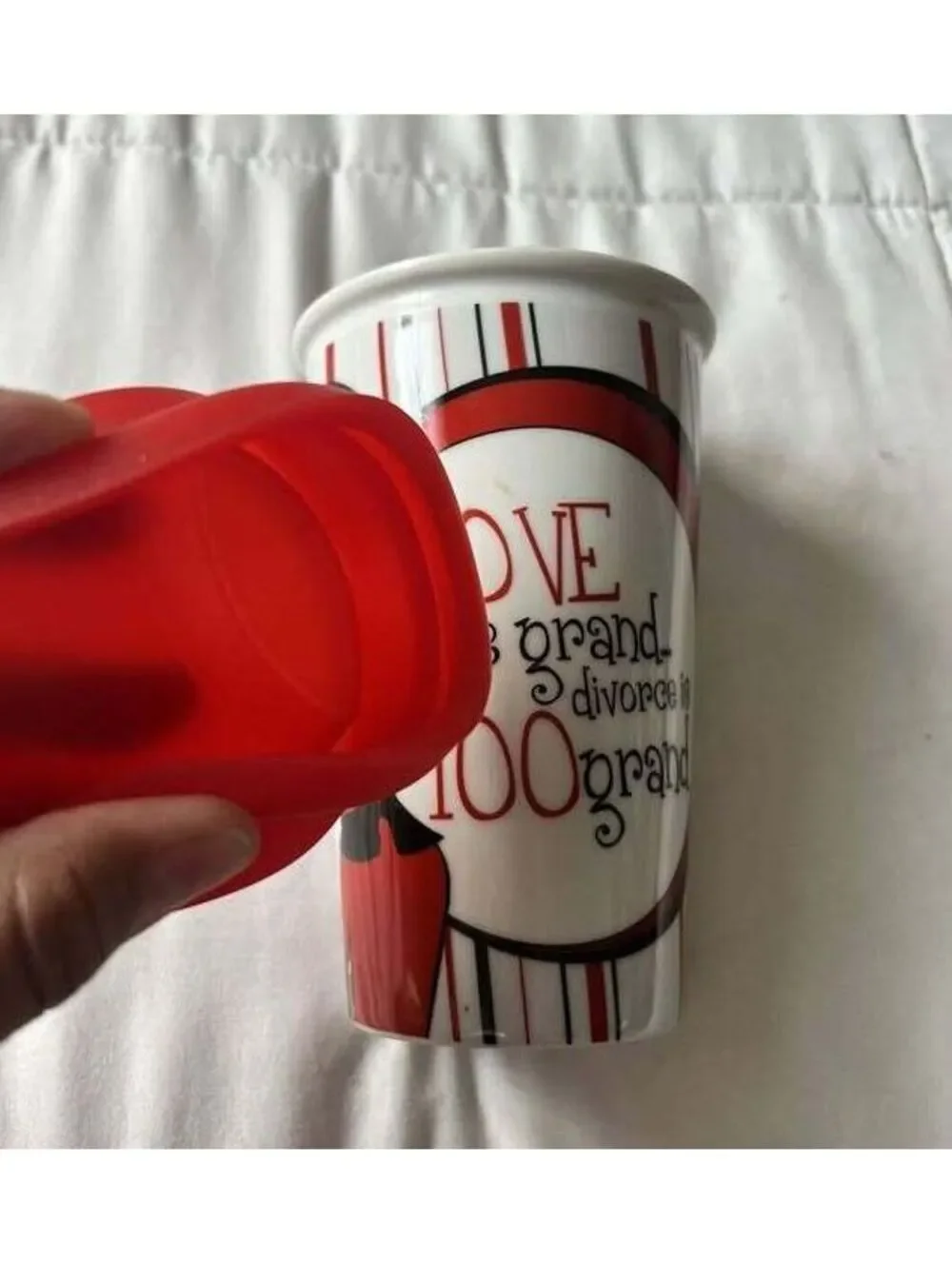 DRINKWARE Ceramic Travel Coffee Mug with Red Silicone Lid and Artistic Design